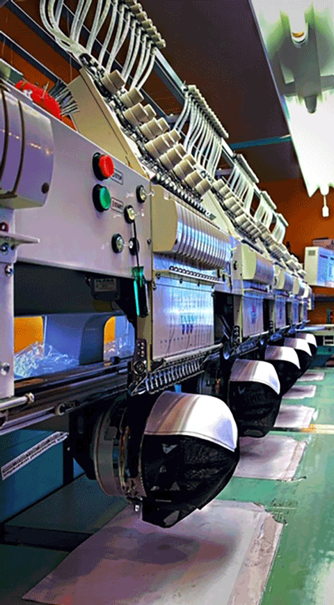 Row of embroidery machines at SS Hansen Embroidery