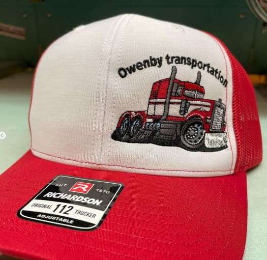 Owenby Transportation trucker cap with a full-color embroidered truck