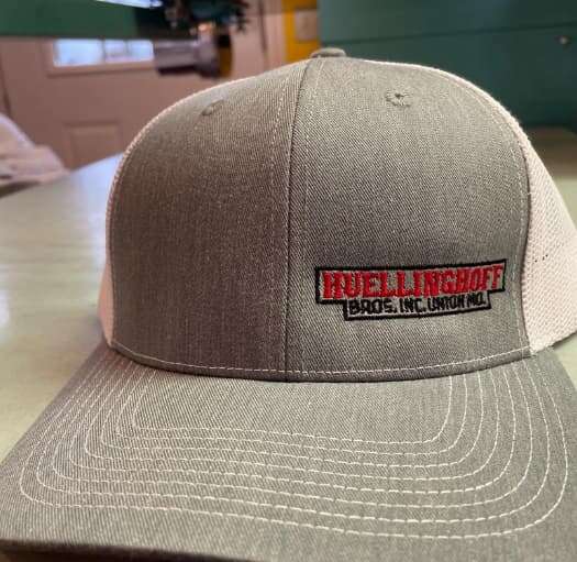 Huellinghoff Bros. logo embroidered on a cap