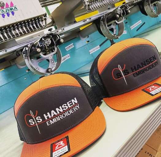 SS Hansen Embroidery hats fresh off the machine