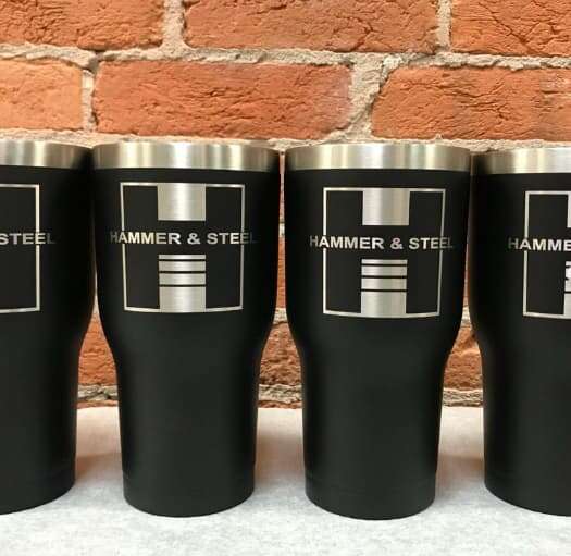Hammer & Steel logo on insulated tumblers