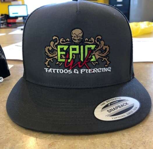 Epic Ink Tattoos & Piercing logo embroidered on a snapback